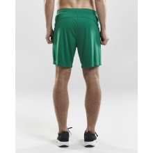 Craft Sporthose (Short) Squad Solid - ohne Innenshort, elastisches Material - grün Herren