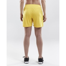 Craft Sporthose (Short) Squad Solid - ohne Innenshort, elastisches Material - gelb Damen