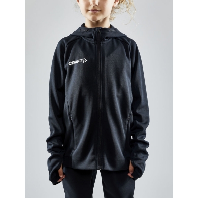 Craft Trainingsjacke Evolve Hood - strapazierfähige Mid-Layer-Kapuzenjacke aus Stretchmaterial - schwarz Kinder