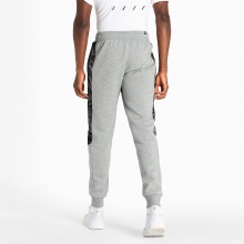 Puma Freizeit Jogginghose Graphic Sweat Pants - Baumwolle, gefüttert - grau Herren